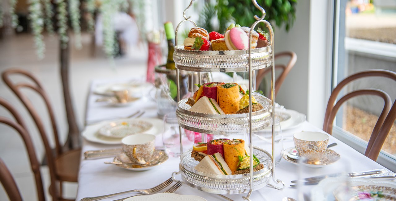 cakes displayed on beautiful silverware